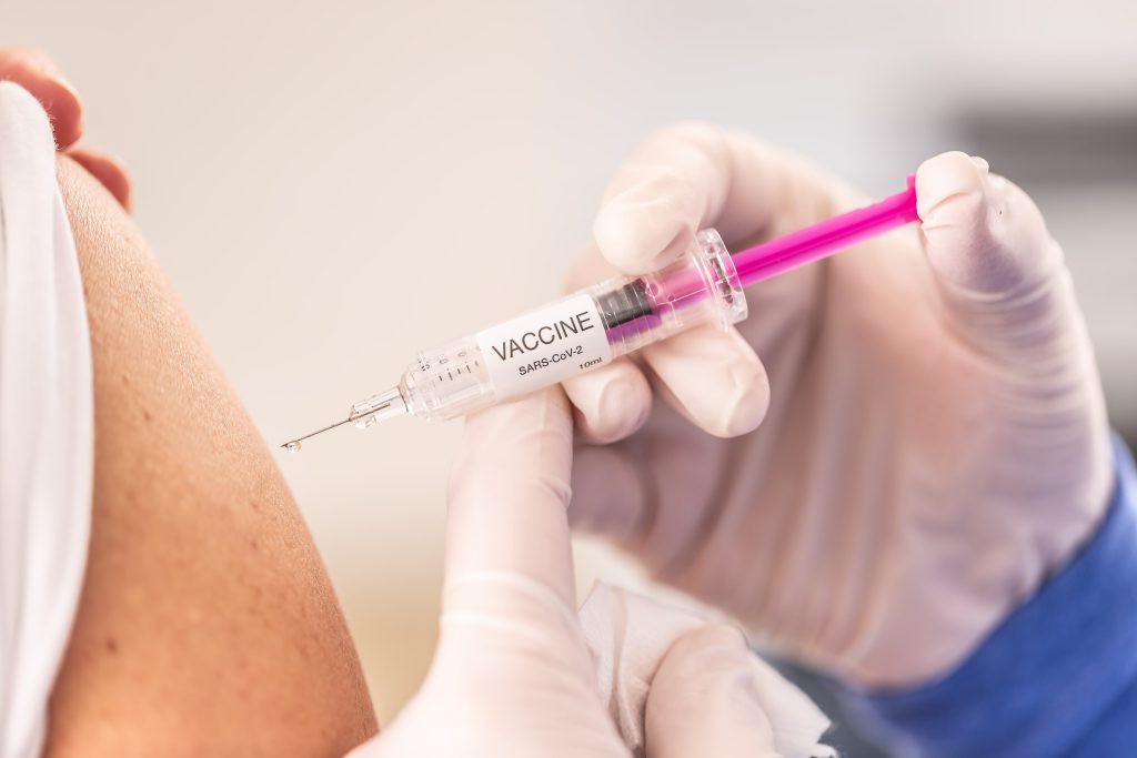 detail-of-an-injection-of-a-sars-cov-2-vaccine-being-shot